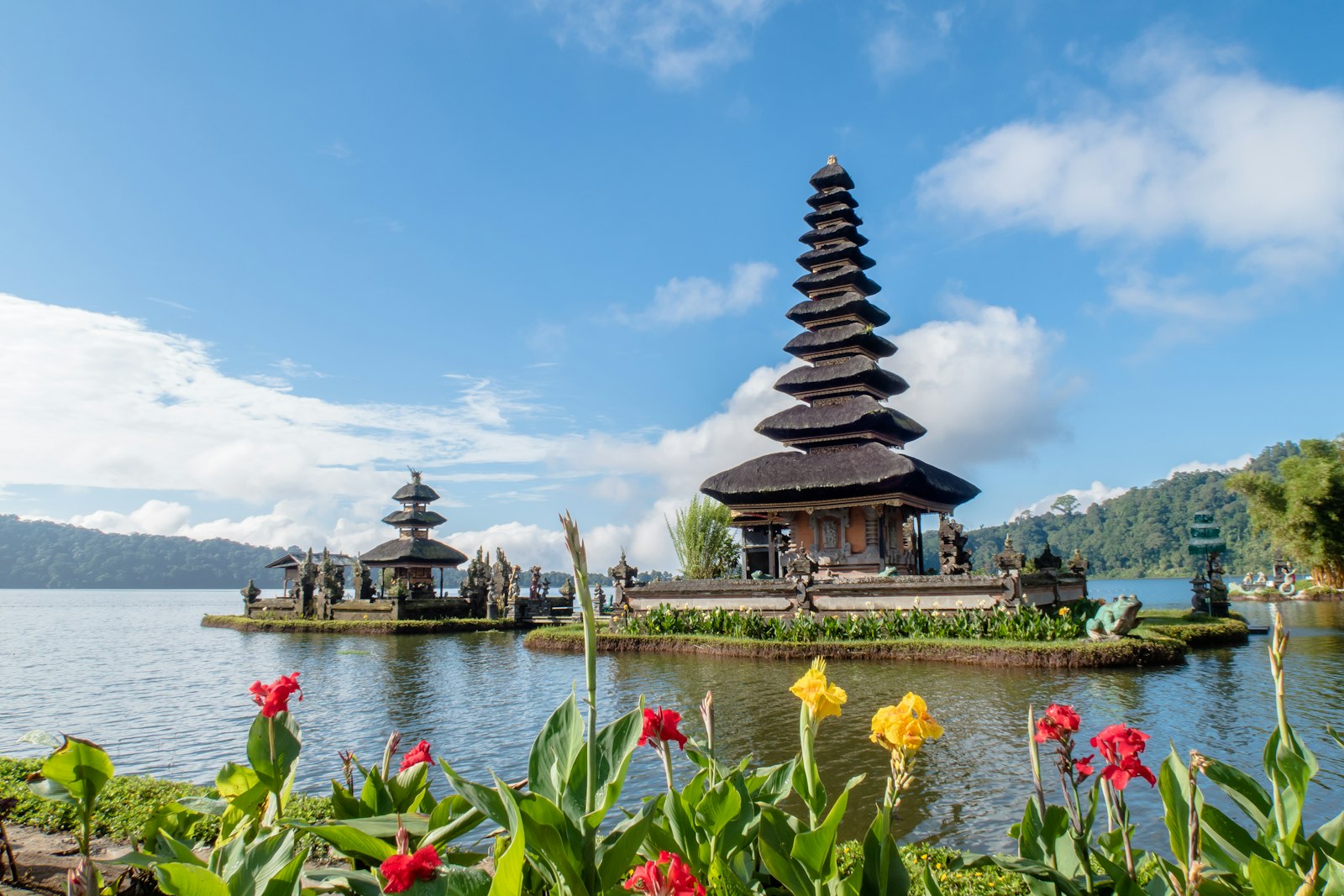 Serene temple on a lake at sunrise
